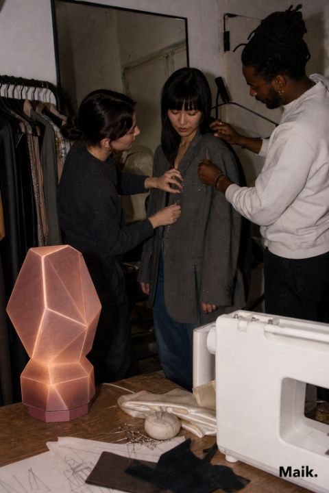 Faceted lamp on a tailor's bench