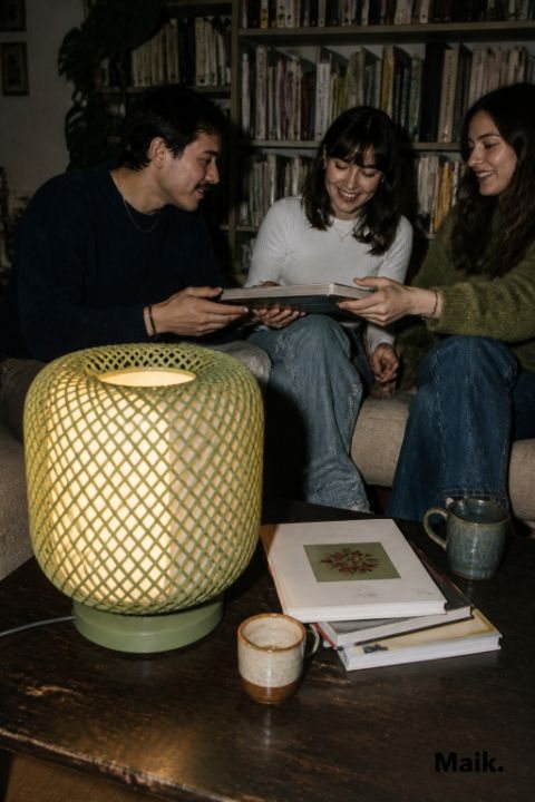 Lattice lamp lit on a coffee table