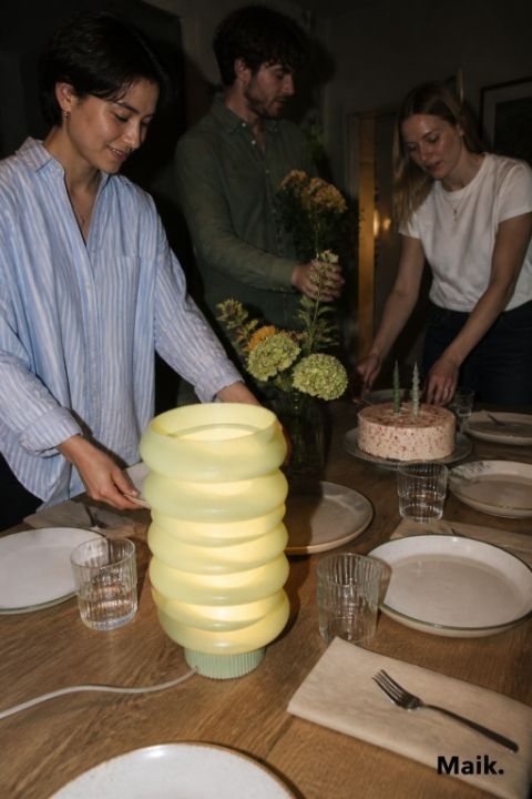 Ridged lamp on a table set for a birthday